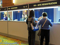 People checking into the convention